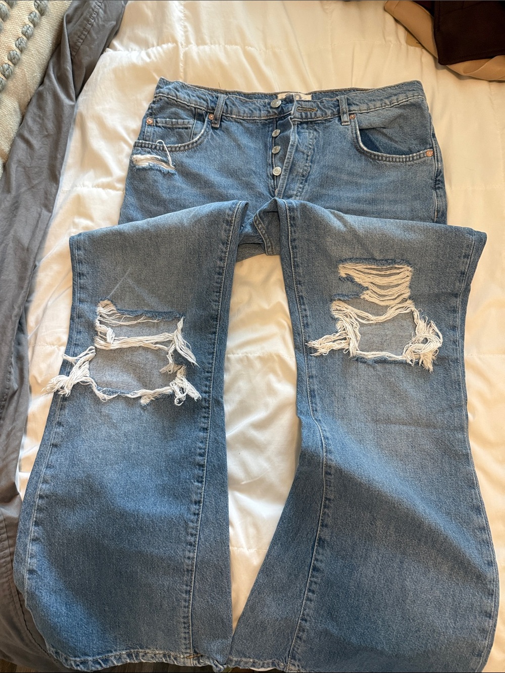 Distressed baggy flare free people jeans